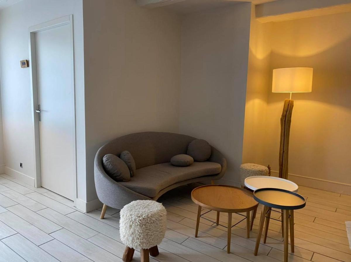 Coin salon dans l'établissement Maison des Dunes