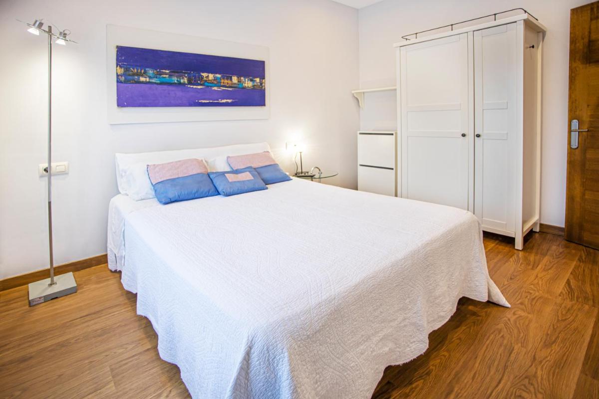 Cama o camas de una habitación en LA CASONA Encanto Rural - ApartaHotel SPA Llanes