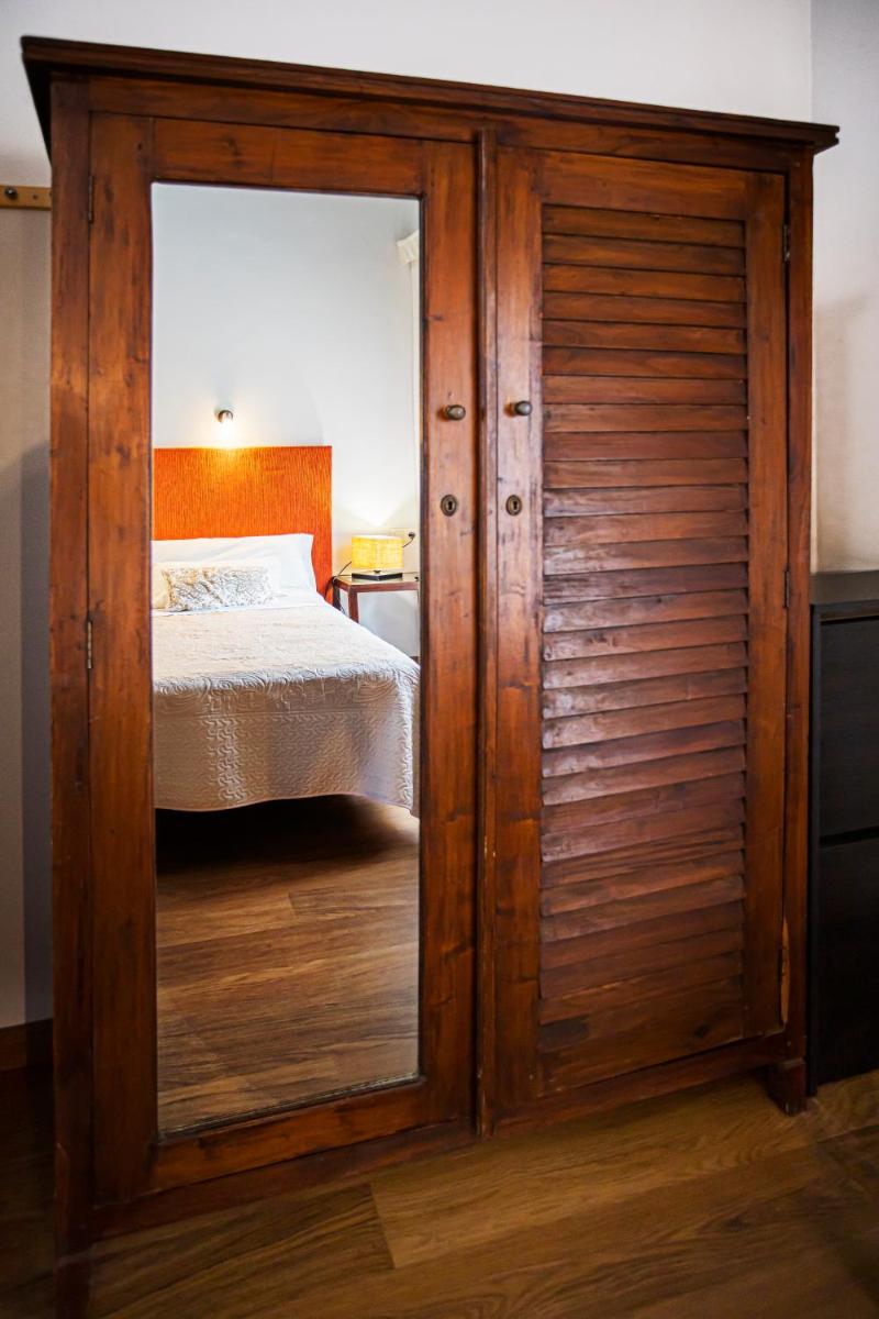 Cama o camas de una habitación en LA CASONA Encanto Rural - ApartaHotel SPA Llanes