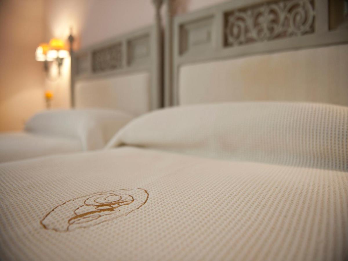 Cama o camas de una habitación en Hotel Bahia