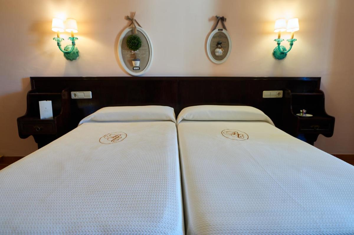 Cama o camas de una habitación en Hotel Bahia