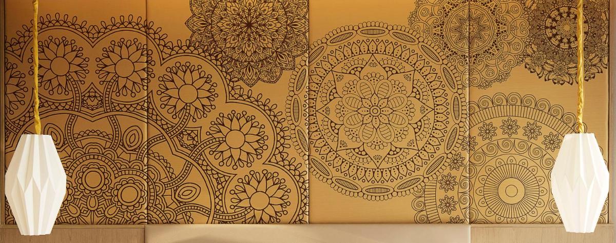 a wall with gold wallpaper and two vases at Taj Wellington Mews Chennai in Chennai