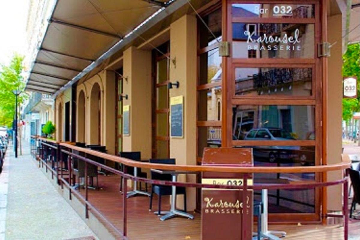 Restaurant ou autre lieu de restauration dans l'établissement Kyriad Restaurant Centre SPA Vichy