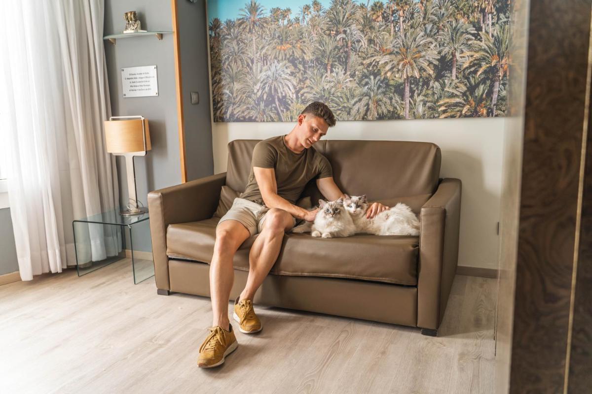 Mascotas con sus dueños en Hotel Boutique Villa Venecia