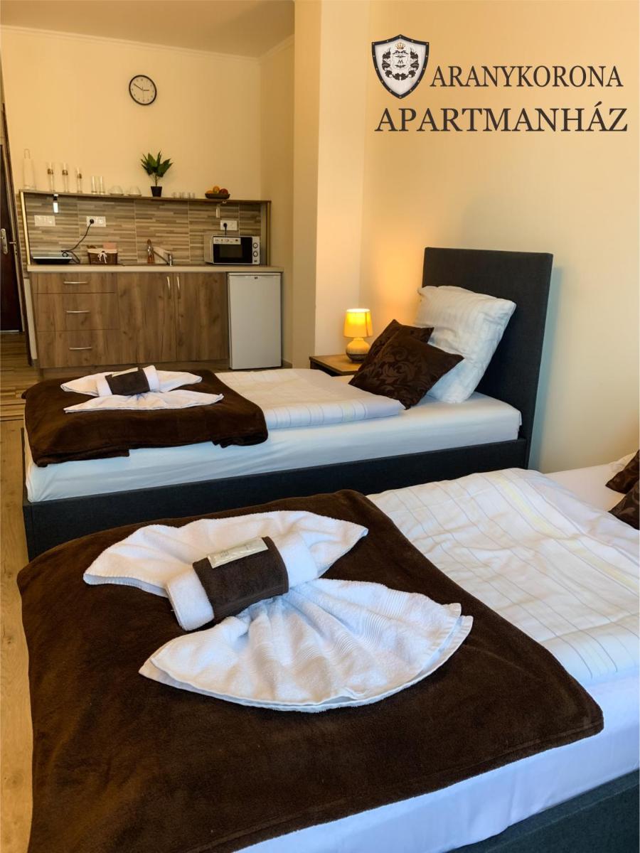 Aranykorona Apartmanház - Housity