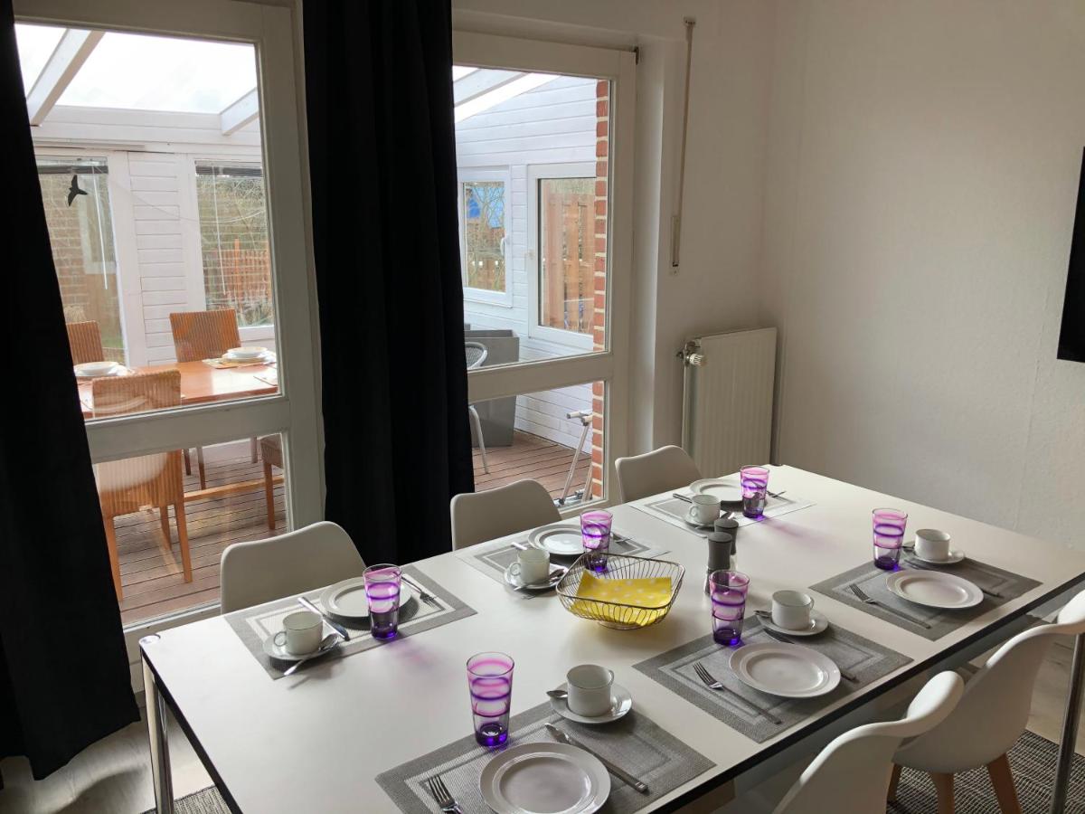 Baumberger Ferienhaus mit Garten & Wintergarten mit 3 Schlafzimmern & 2 Bädern - Housity