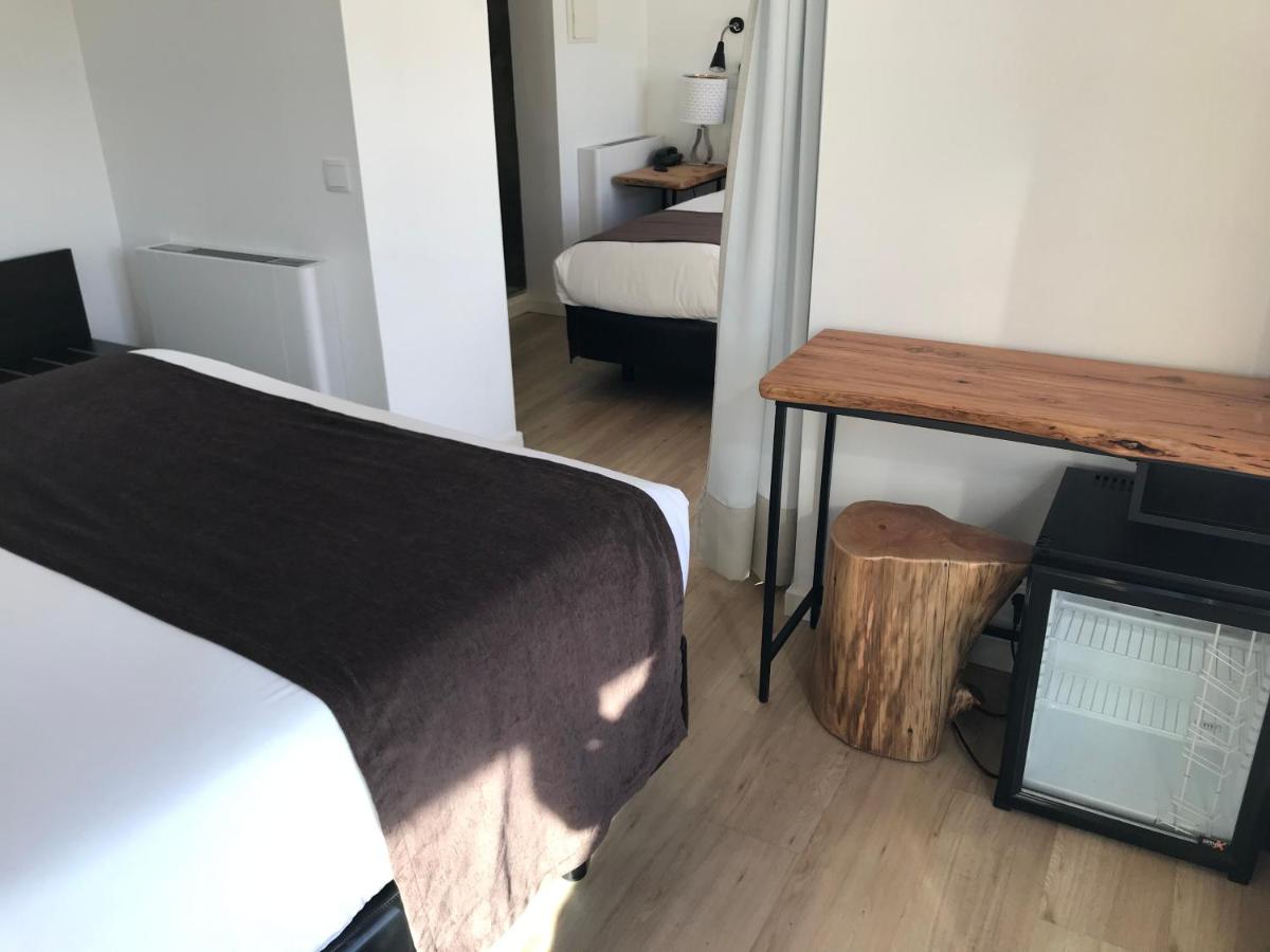 Uma cama ou camas num quarto em Promar - Eco Beach & Spa Hotel