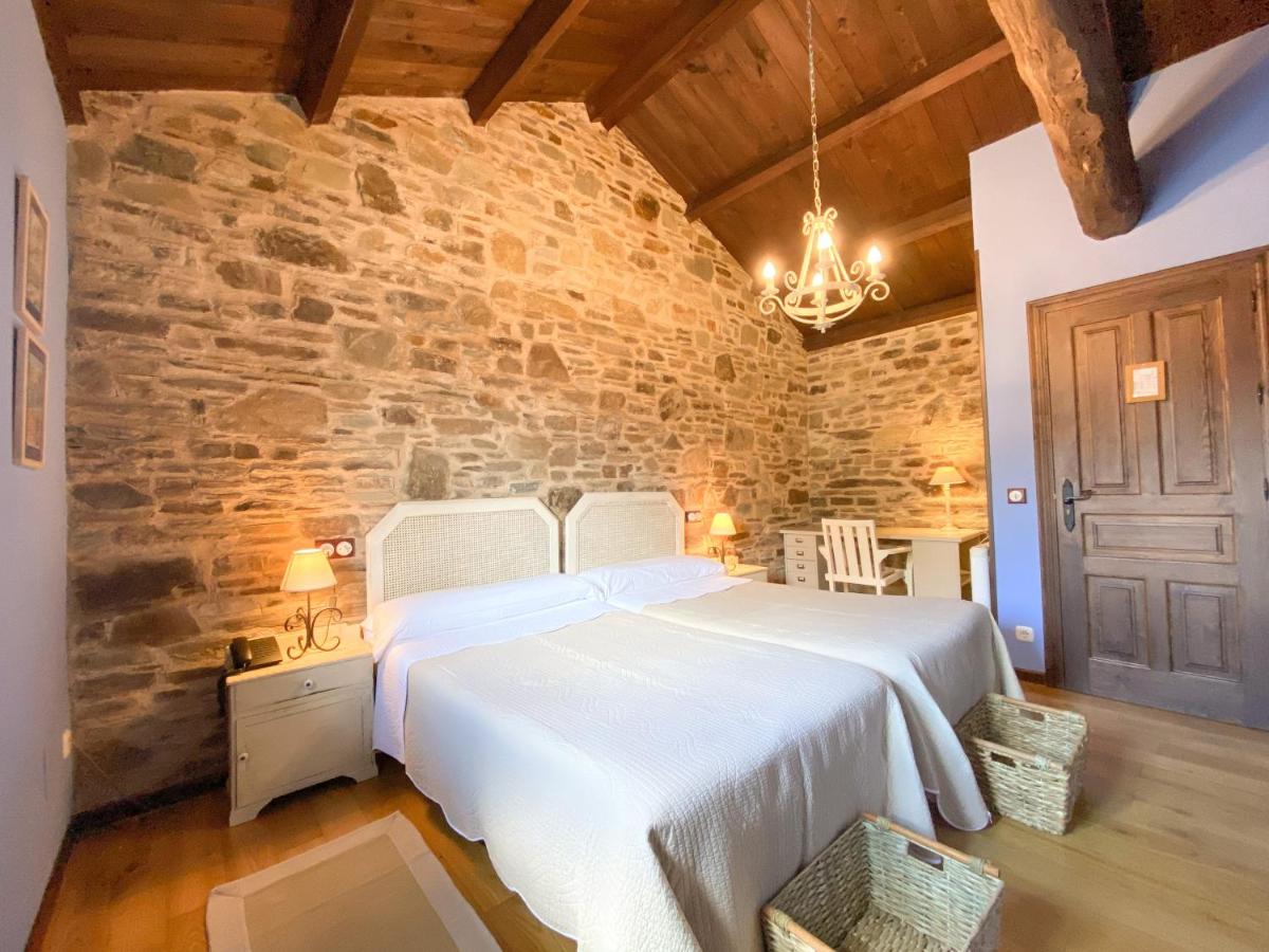Cama o camas de una habitación en Hotel Casa Cachón