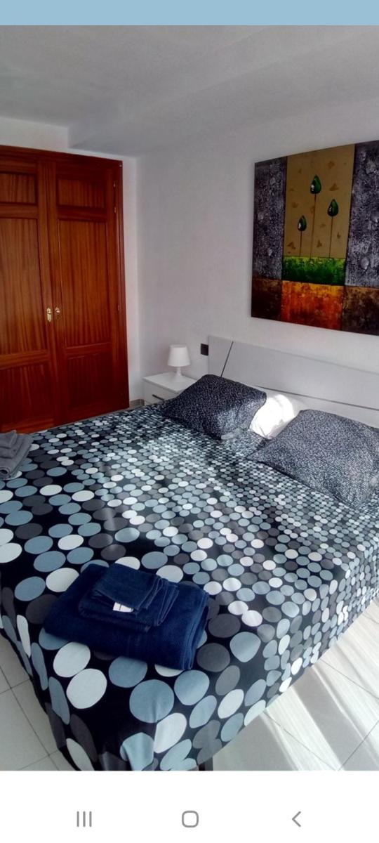 Un dormitorio frente playa El Medano - Housity