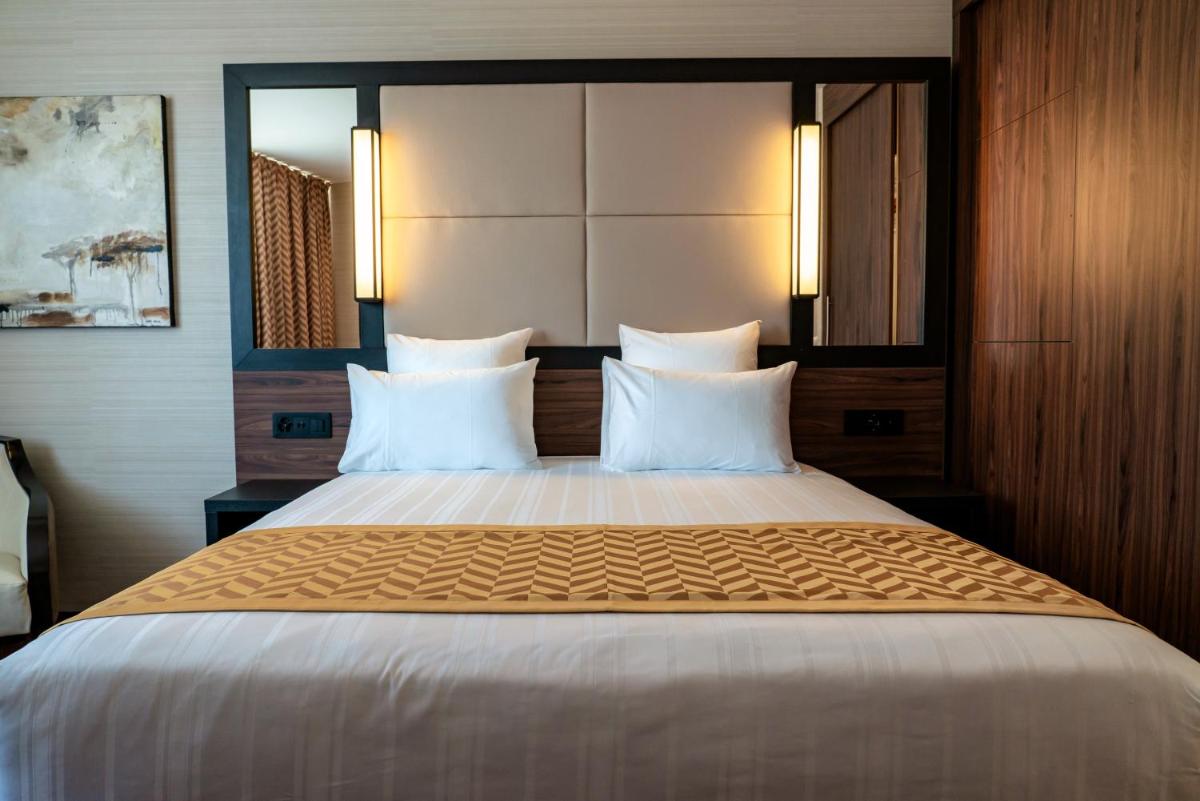 Nash Suites Airport Hotel - Housity
