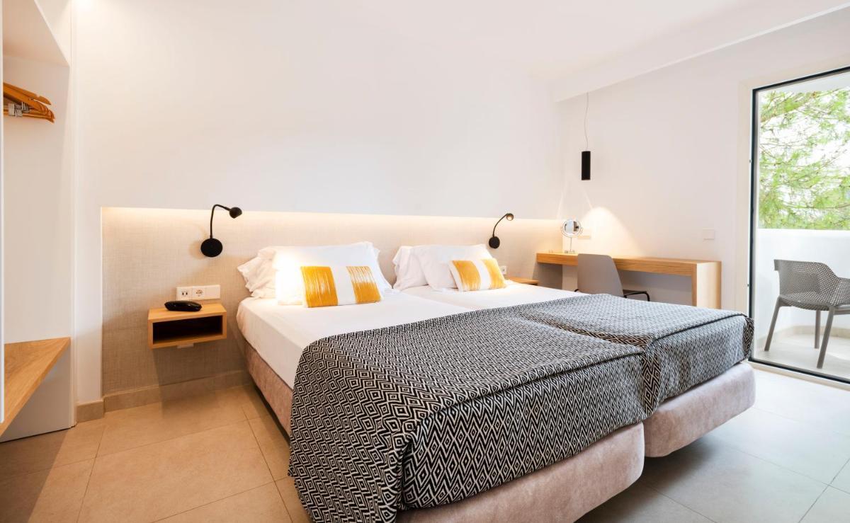 Cama o camas de una habitación en Inturotel Esmeralda Park
