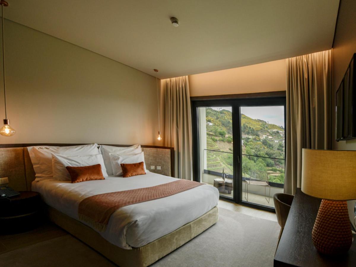 Uma cama ou camas num quarto em MW Douro Wine & Spa