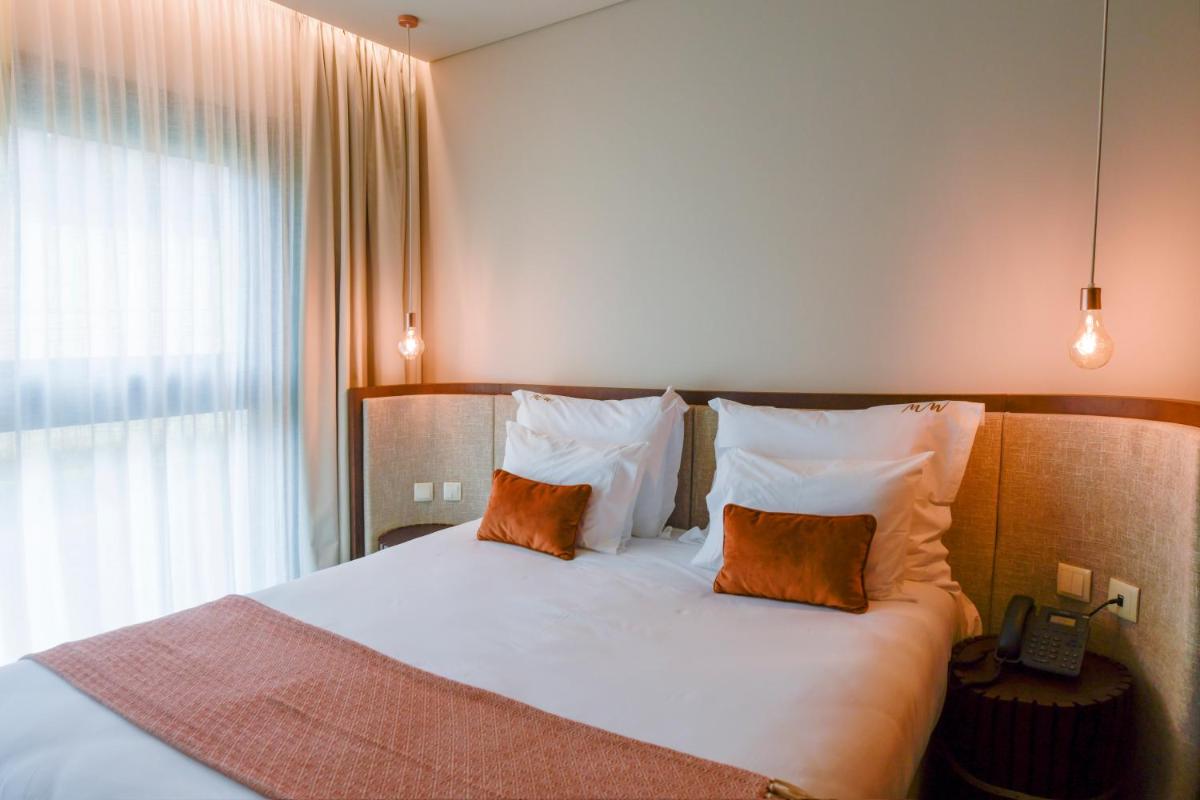 Uma cama ou camas num quarto em MW Douro Wine & Spa