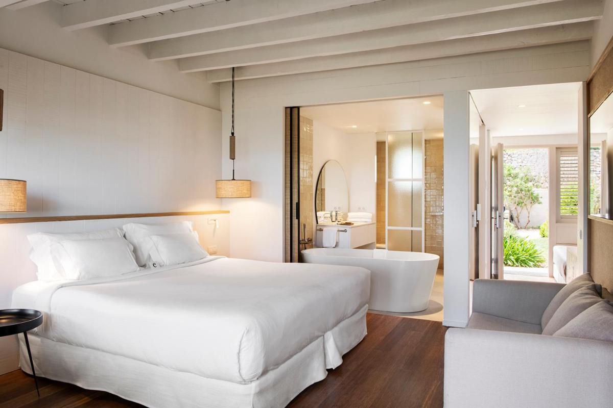 Cama o camas de una habitación en Hostal Empúries