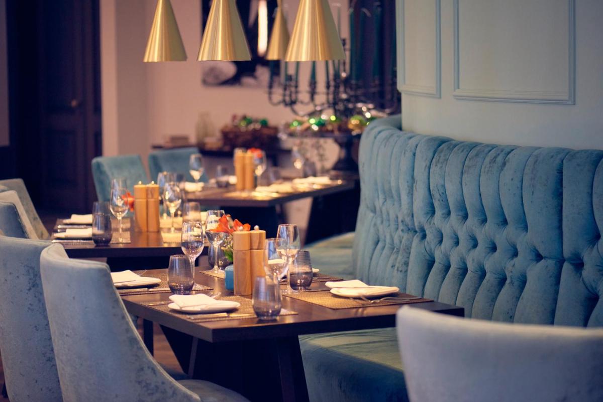 Ein Sitzbereich in der Unterkunft VILA VITA Rosenpark Ein Sitzbereich in der Unterkunft VILA VITA Rosenpark