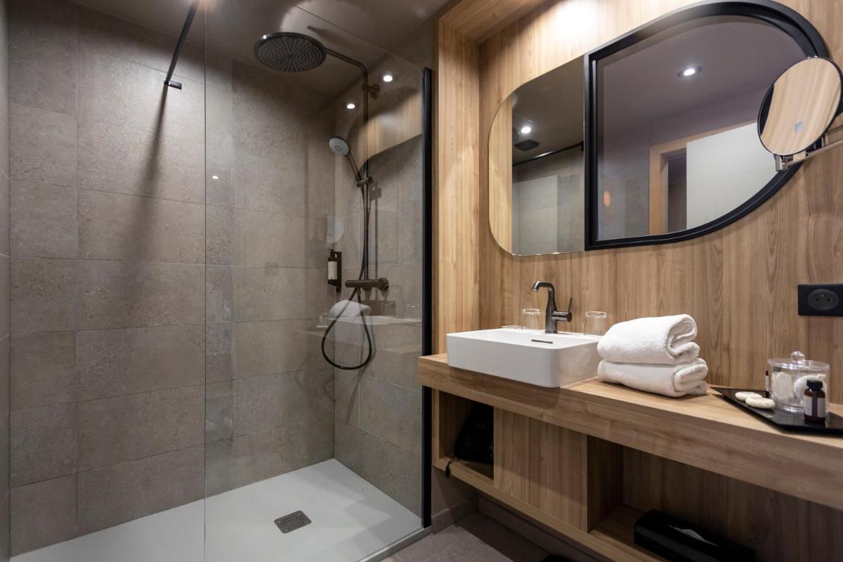 Salle de bains dans l'établissement Hotel L'Acquale