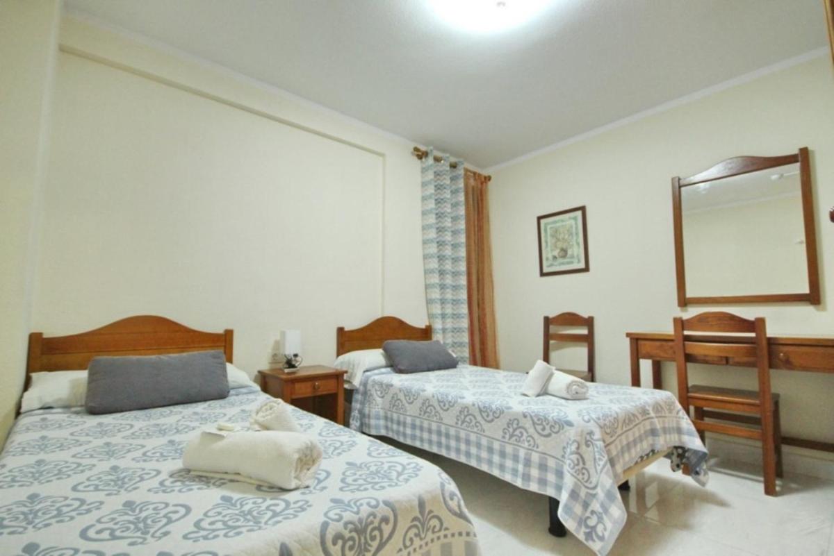 Two bedroom apartment in beachfront complex with pool in Playa de Las Américas. - Housity