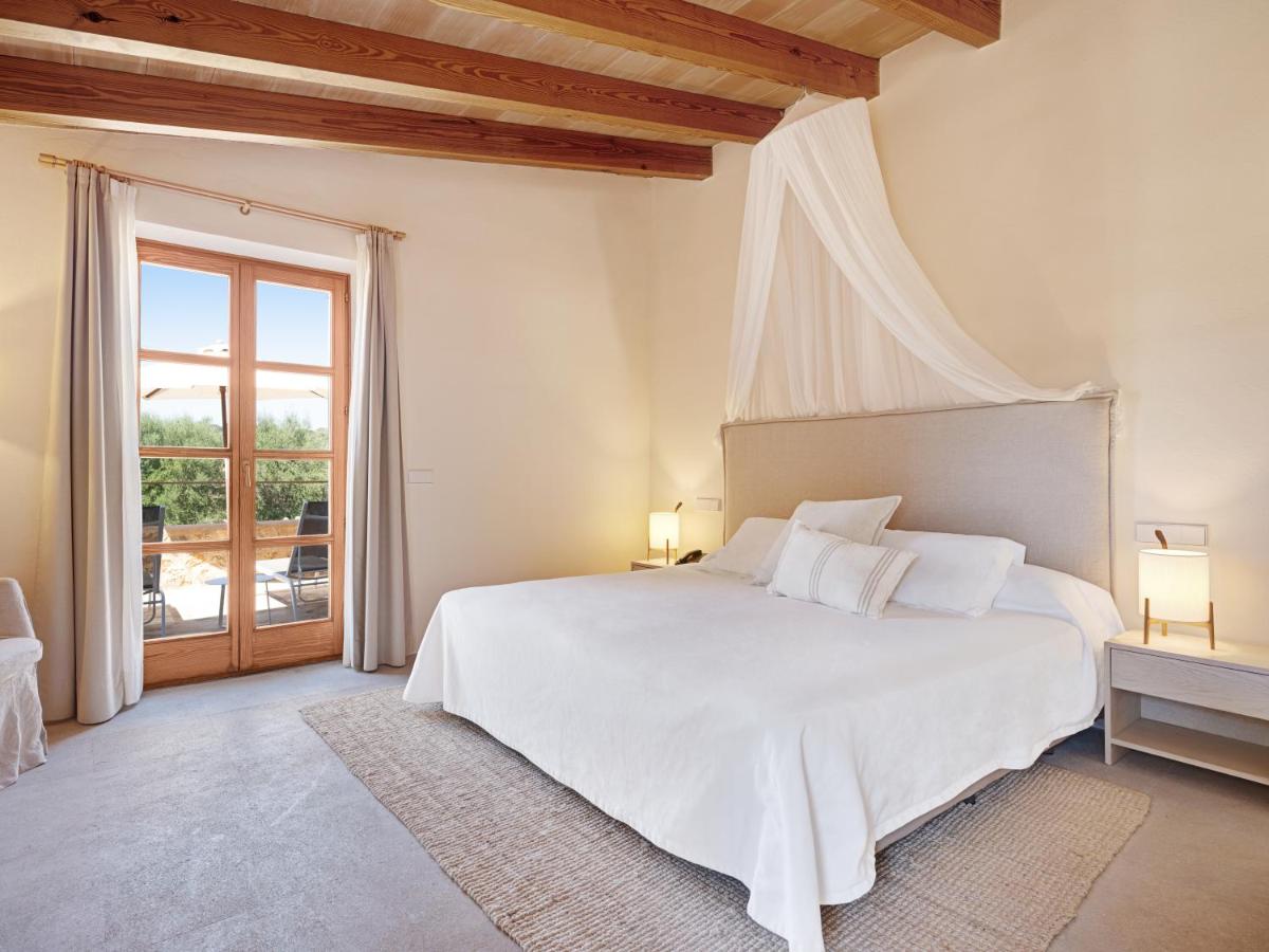 Cama o camas de una habitación en Son Penya Adults Only Petit Hotel & Spa