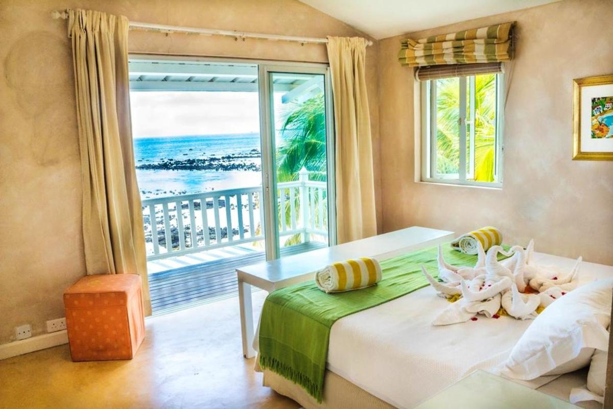 2 bedrooms house with sea view shared pool and furnished terrace at Pointe aux Biches Camp Bestel - Housity