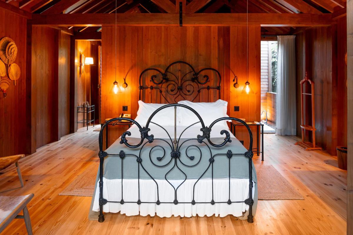 Uma cama ou camas num quarto em Senhora da Rosa, Tradition & Nature Hotel
