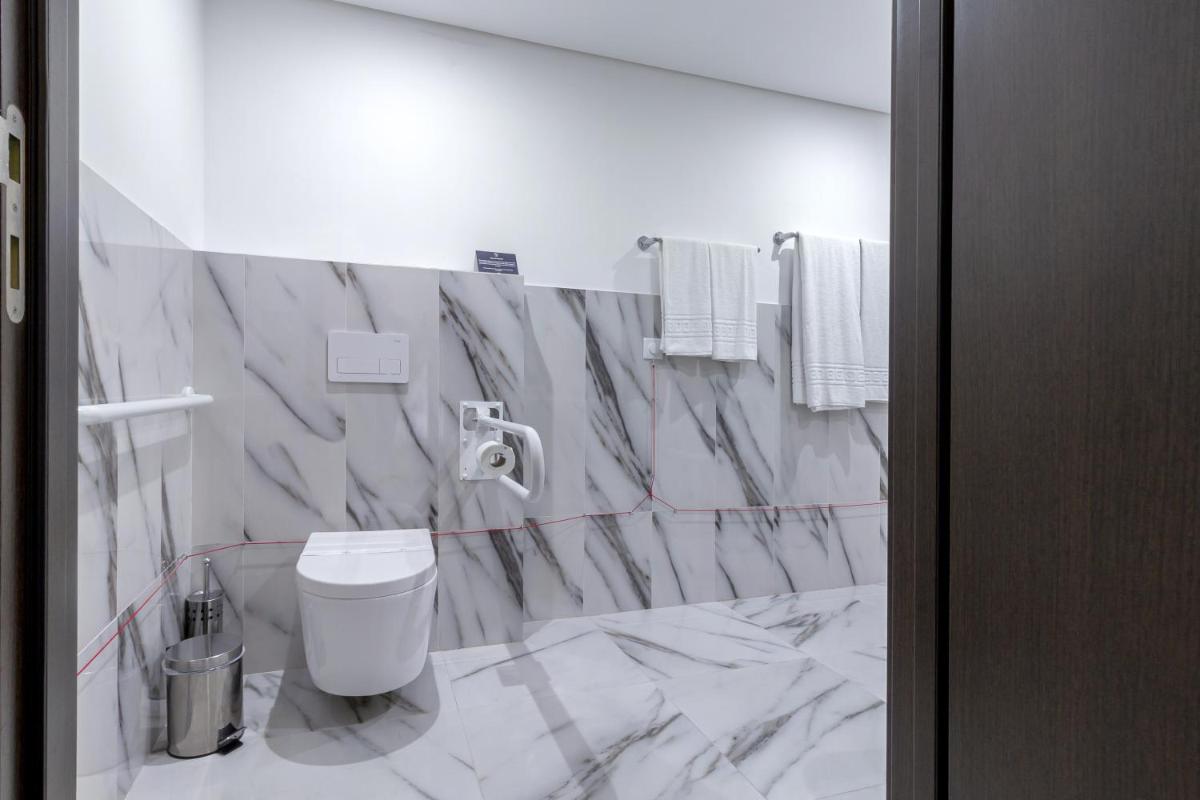 Uma casa de banho em In Gold Hotel & Spa