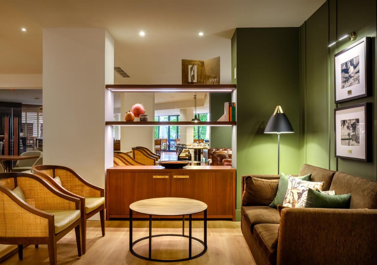 Uma área de estar em Evora Hotel