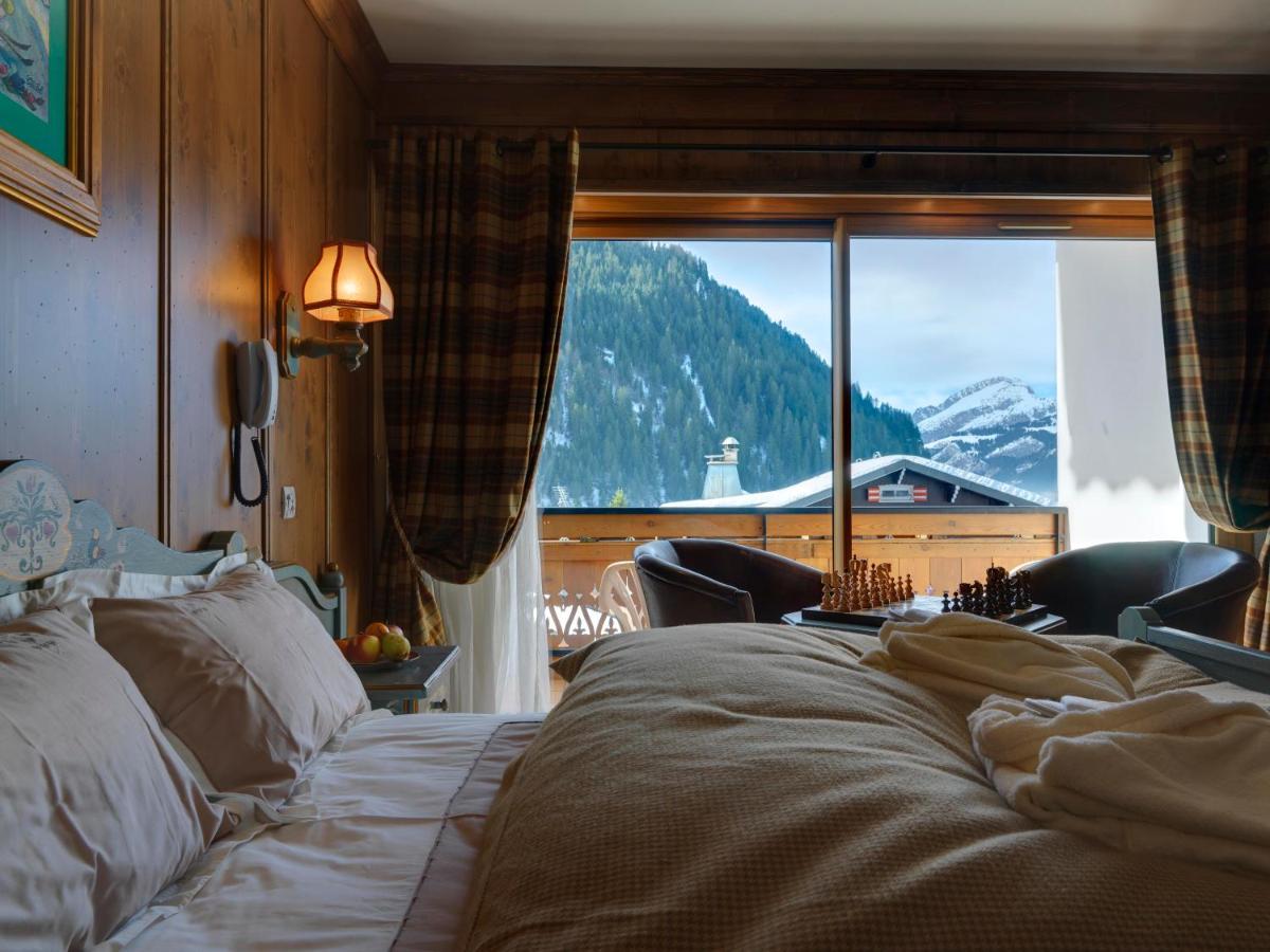 Un ou plusieurs lits dans un hébergement de l'établissement Hôtel Macchi Restaurant & Spa