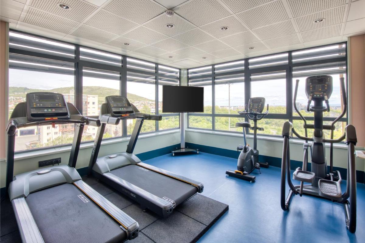 Salle ou équipements de sports de l'établissement Aiden by Best Western Clermont-Ferrand Hotel & Spa
