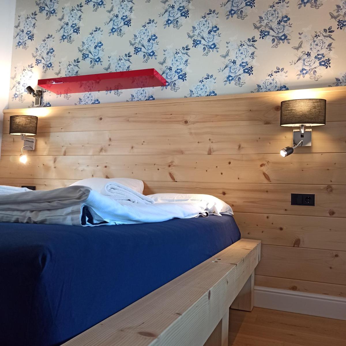 Ein Bett oder Betten in einem Zimmer der Unterkunft Design Hotel ALPENLIEBE - - - - Boutique-Flair - - - -