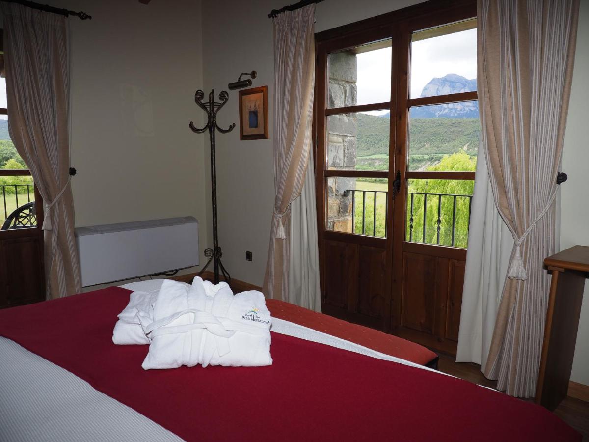 Cama o camas de una habitación en Hotel & SPA Peña Montañesa