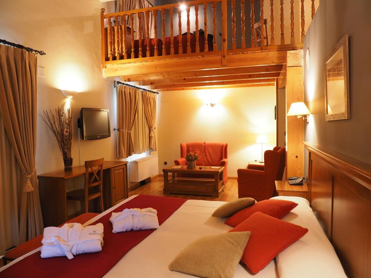 Cama o camas de una habitación en Hotel & SPA Peña Montañesa