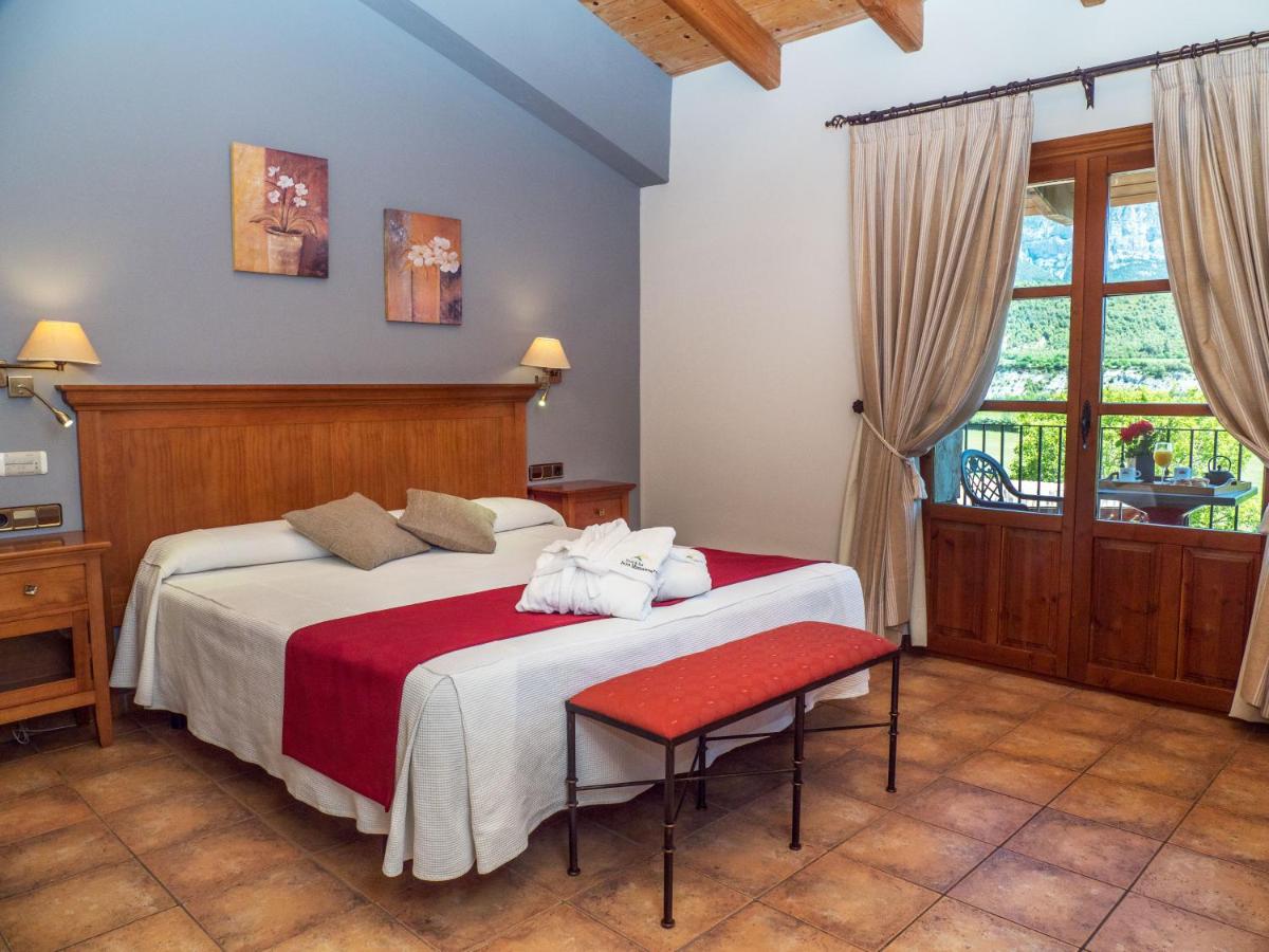 Cama o camas de una habitación en Hotel & SPA Peña Montañesa