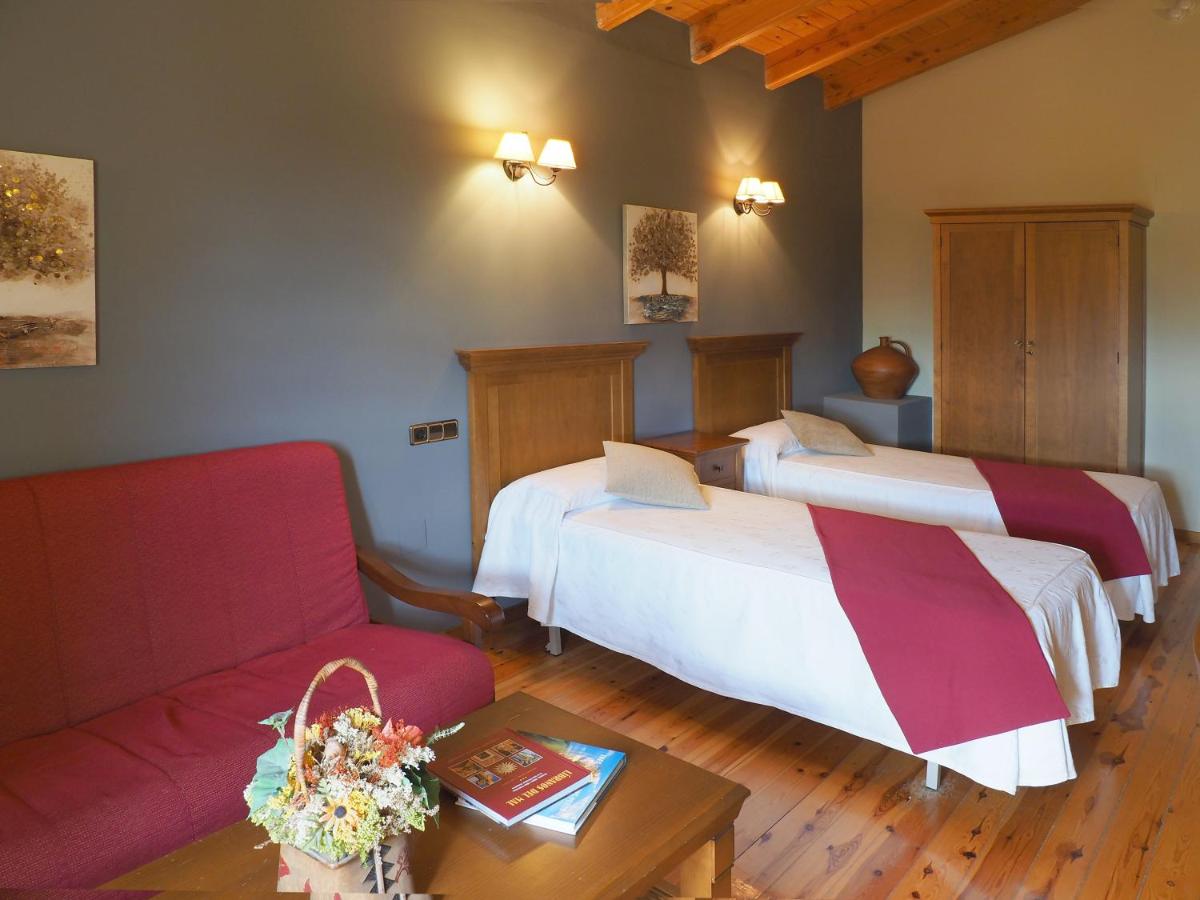 Cama o camas de una habitación en Hotel & SPA Peña Montañesa