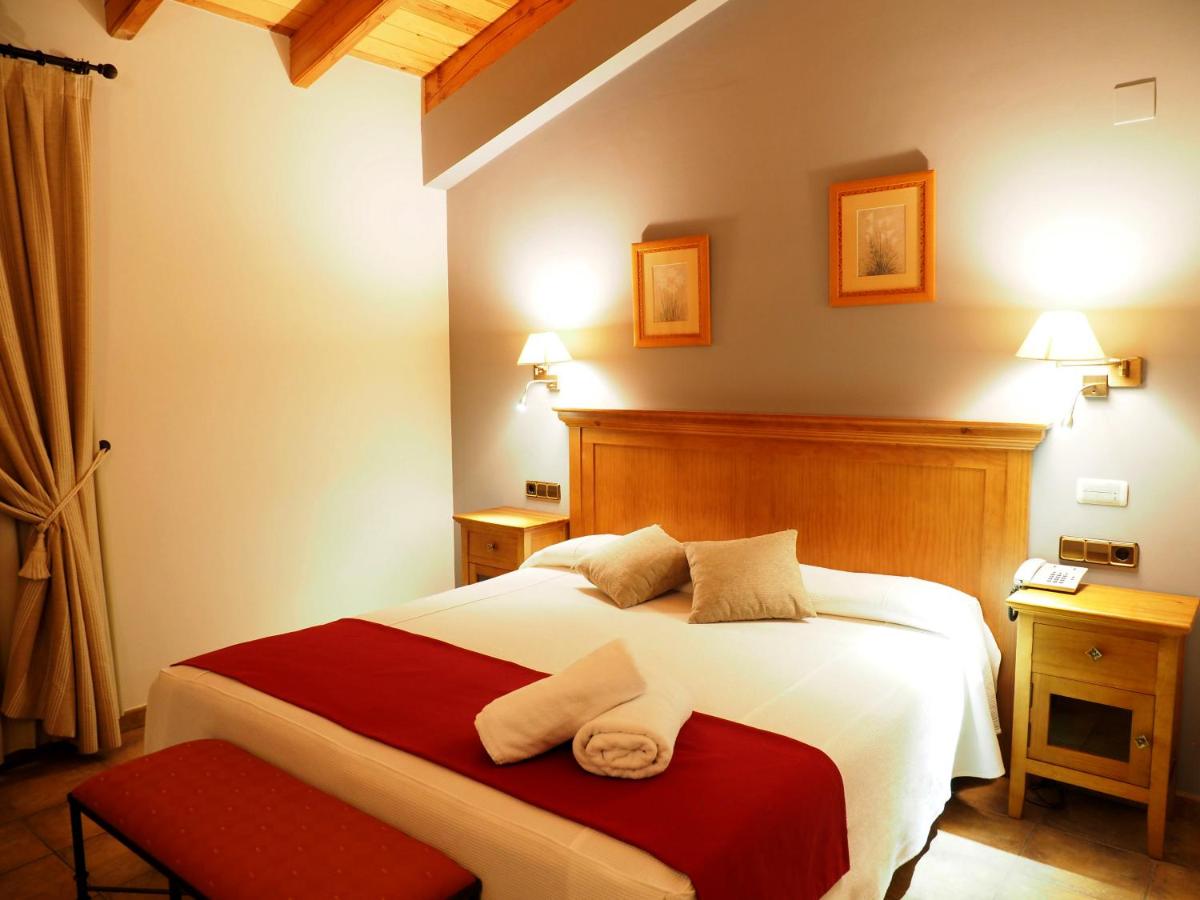 Cama o camas de una habitación en Hotel & SPA Peña Montañesa