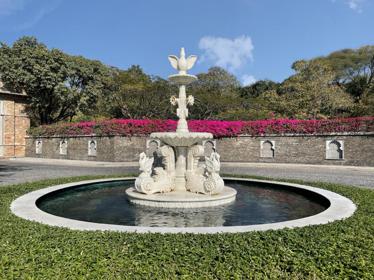 a fountain with three birds sitting on top of it at Trident Udaipur in Udaipur