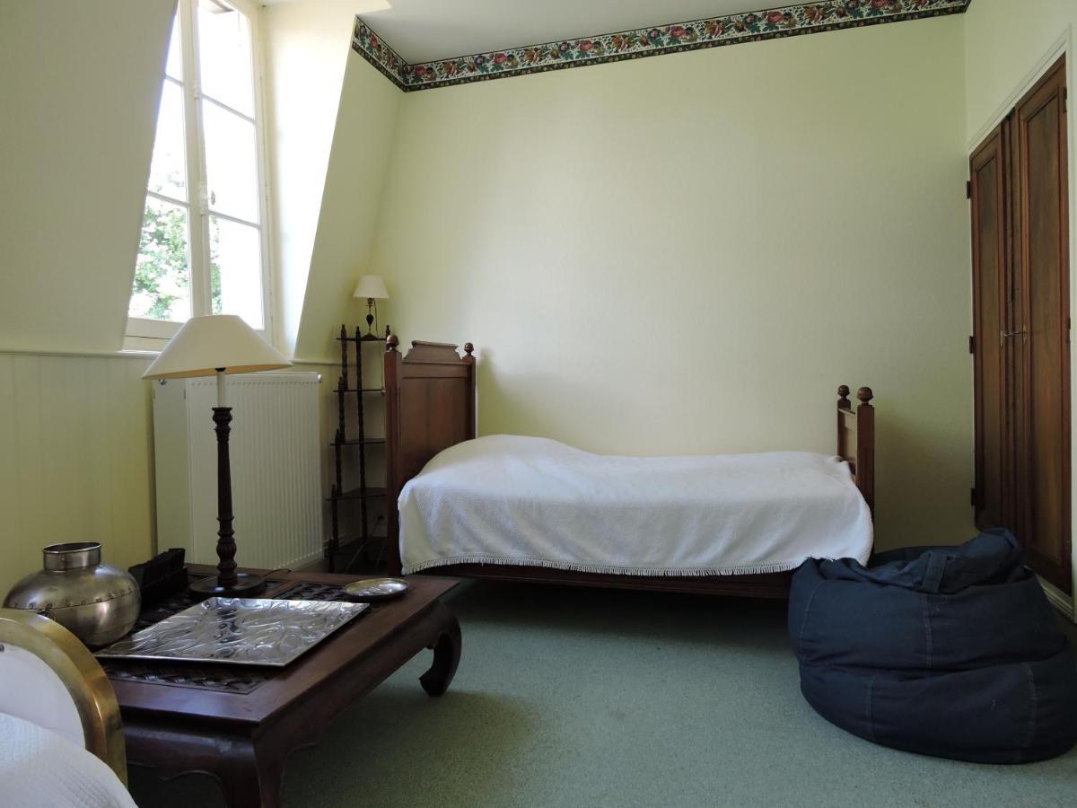 Un ou plusieurs lits dans un hébergement de l'établissement Le Domaine de Mestré, The Originals Relais