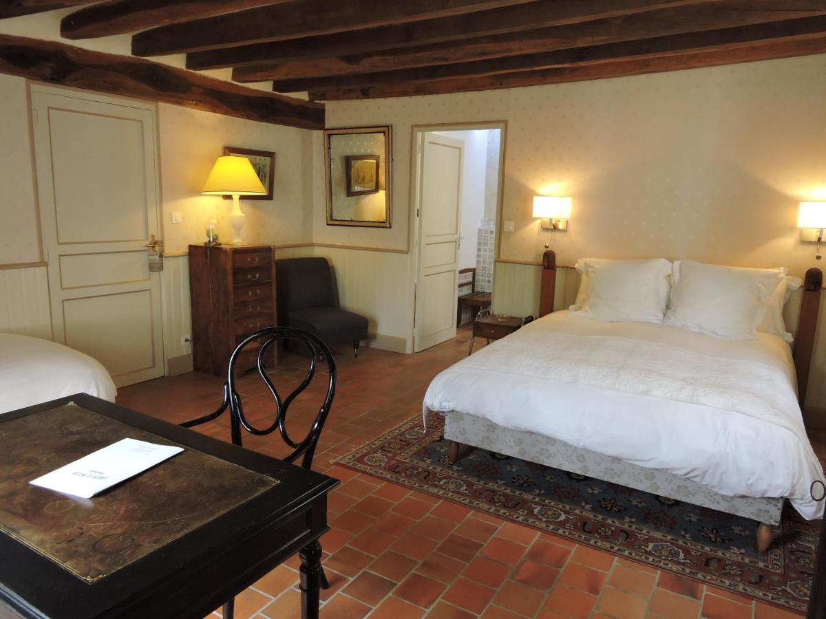 Un ou plusieurs lits dans un hébergement de l'établissement Le Domaine de Mestré, The Originals Relais