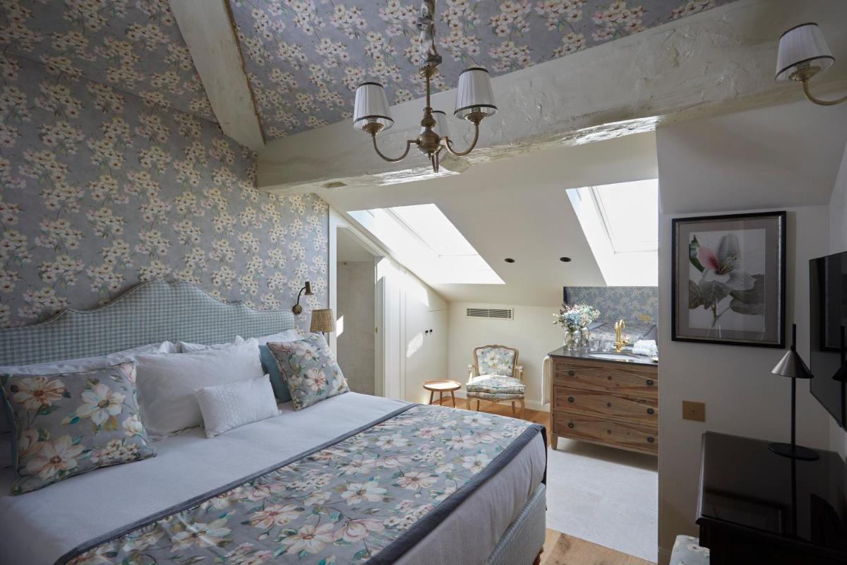 Cama o camas de una habitación en Helguera Palacio Boutique & Antique
