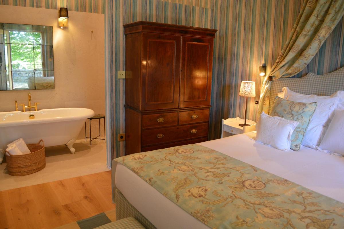 Cama o camas de una habitación en Helguera Palacio Boutique & Antique