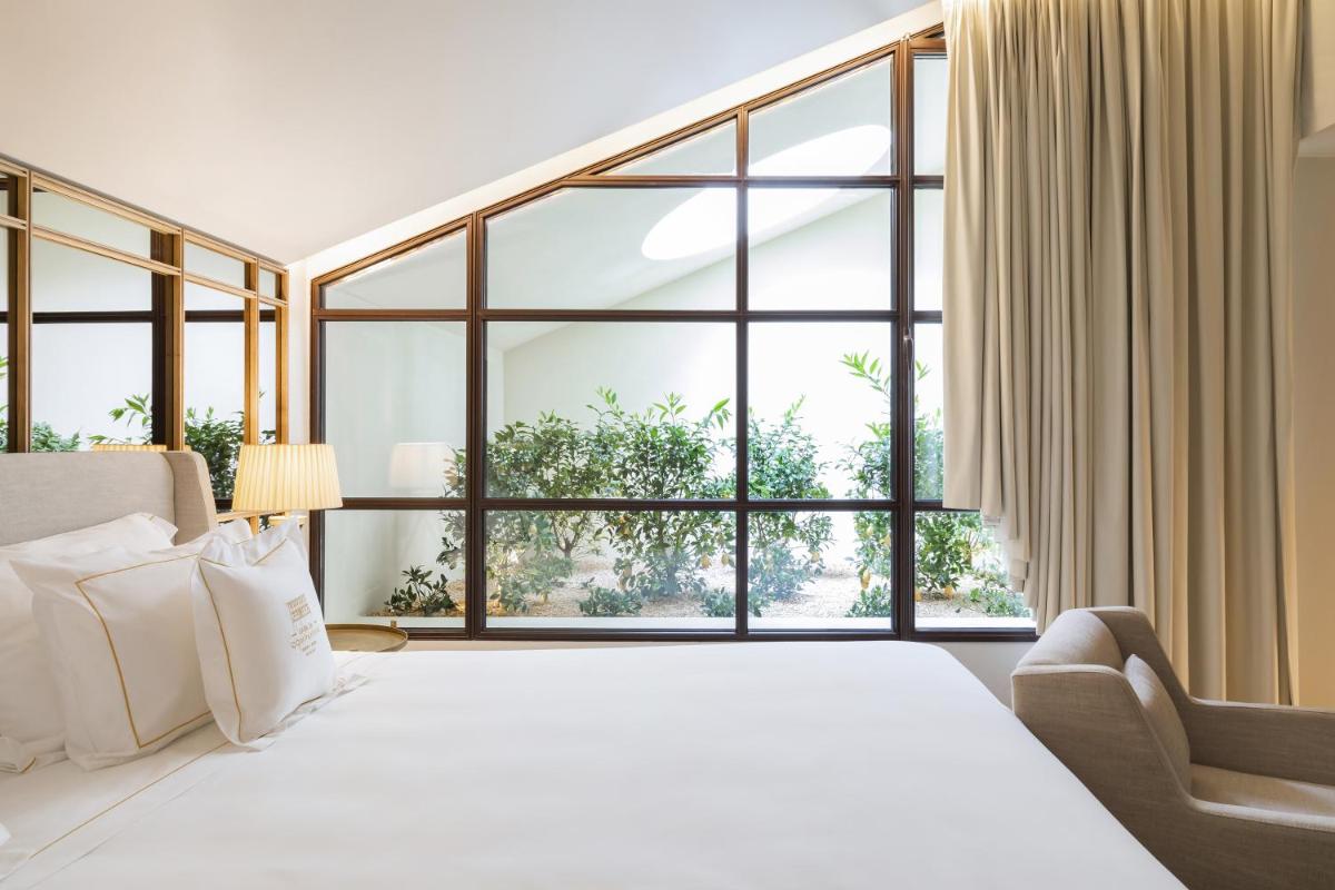 Uma cama ou camas num quarto em Casa da Companhia Hotel & Spa, Vignette Collection by IHG