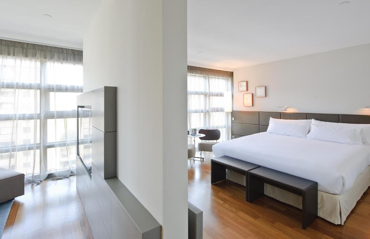 Cama o camas de una habitación en Hotel Reina Petronila