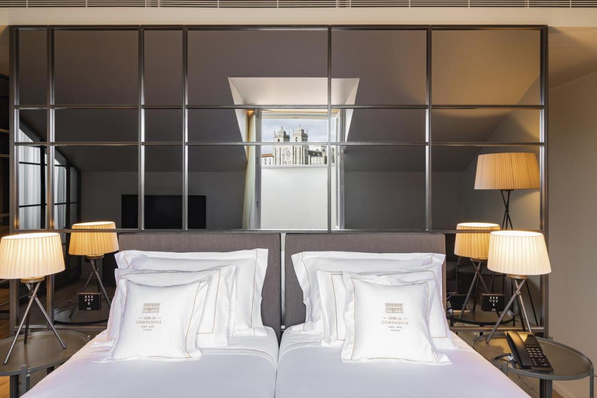 Uma cama ou camas num quarto em Casa da Companhia Hotel & Spa, Vignette Collection by IHG