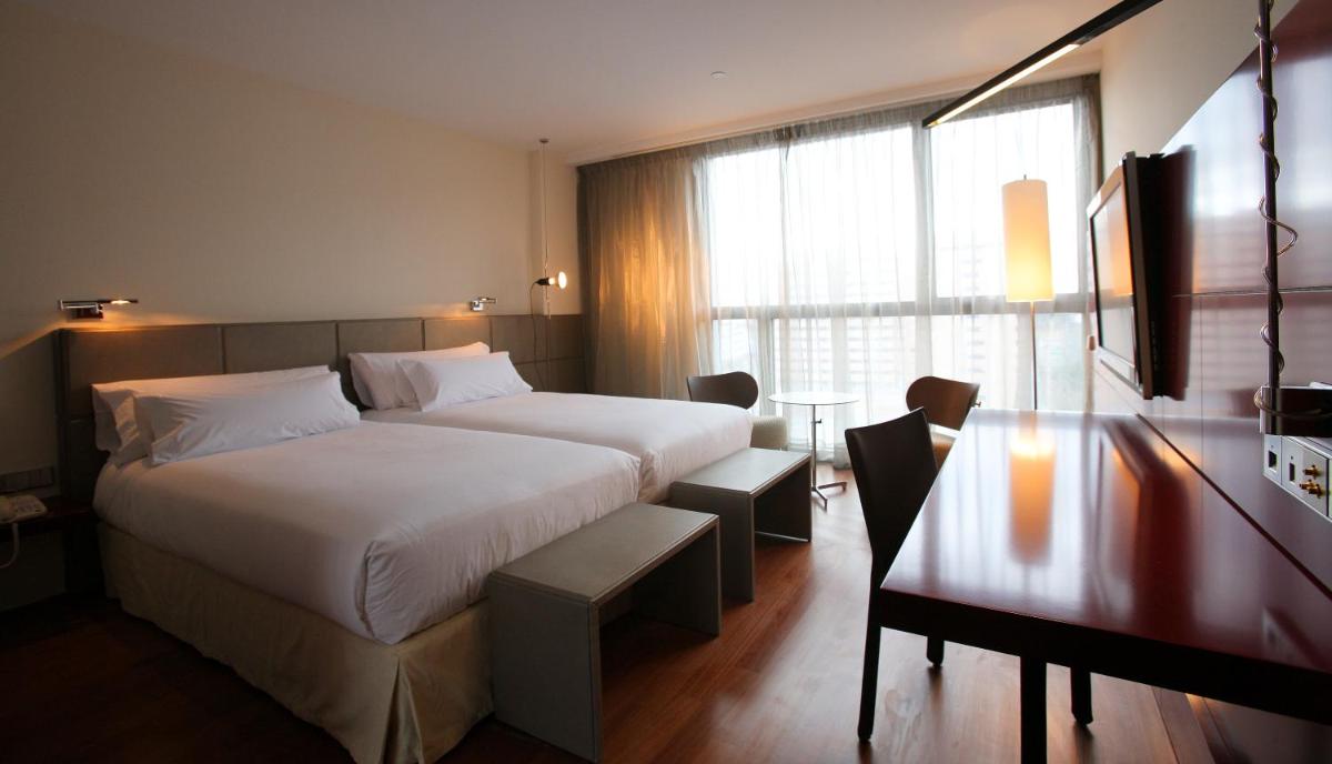Cama o camas de una habitación en Hotel Reina Petronila