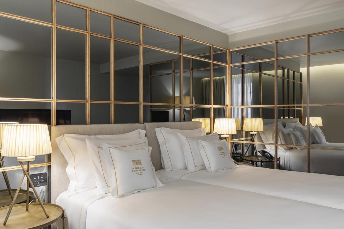 Uma cama ou camas num quarto em Casa da Companhia Hotel & Spa, Vignette Collection by IHG