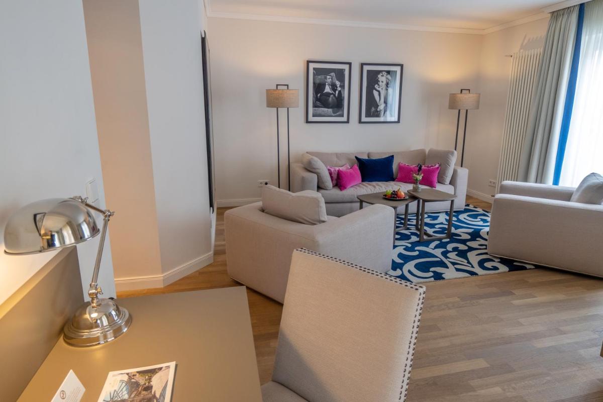 Ein Sitzbereich in der Unterkunft VILA VITA Rosenpark Ein Sitzbereich in der Unterkunft VILA VITA Rosenpark