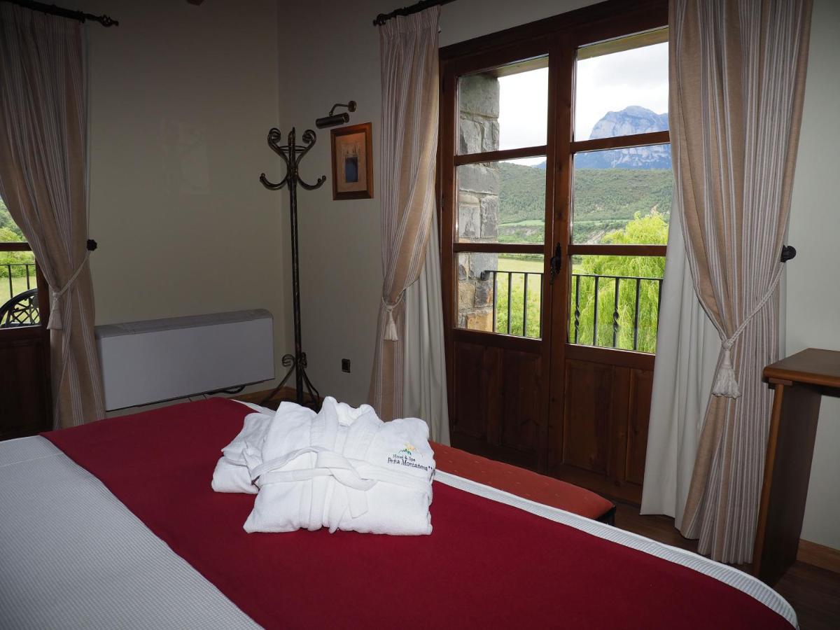 Cama o camas de una habitación en Hotel & SPA Peña Montañesa