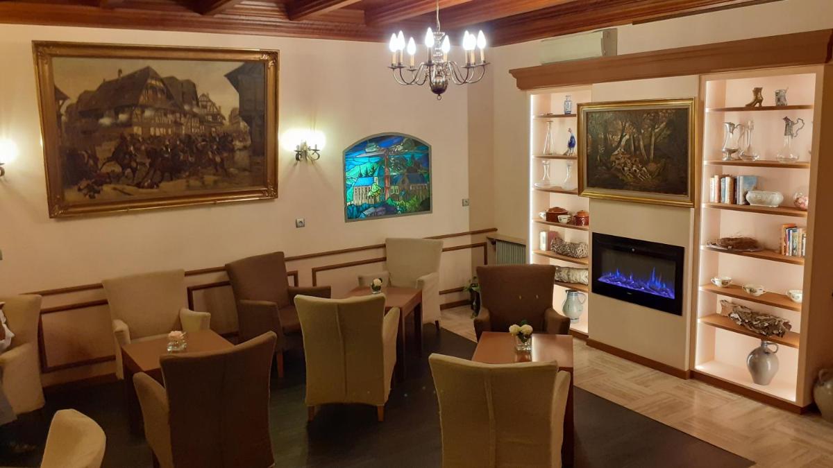 Coin salon dans l'établissement Hotel Munsch Restaurant & Wellness, Colmar Nord - Haut-Koenigsbourg