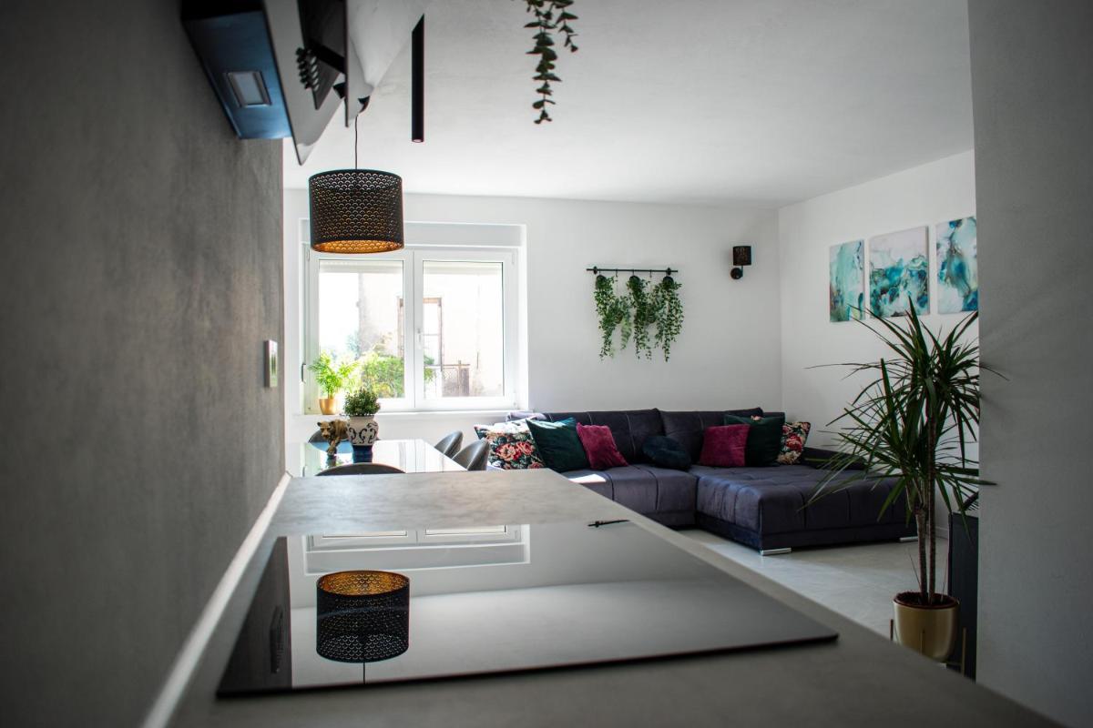 Apartmaji na placu - Housity