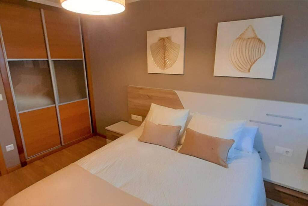 APARTAMENTO PLAYA FOZ con piscina y parking 010 - Housity