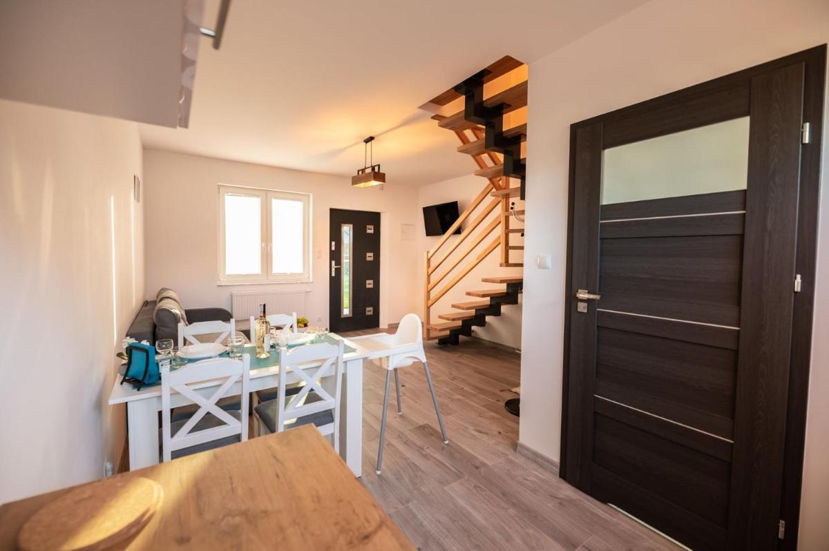 Spokojne Miejsce - domki - apartamenty nad morzem - Housity